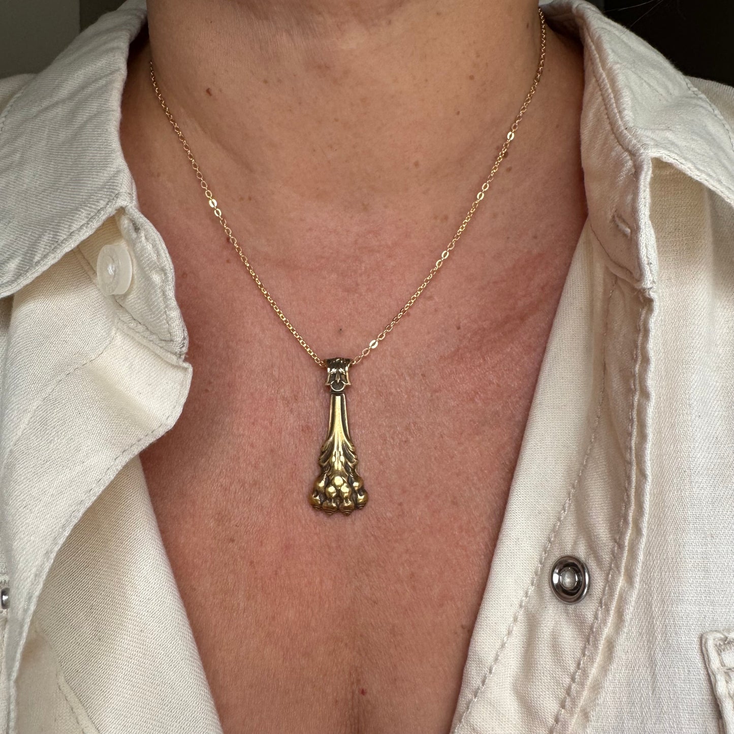 Victorian lucky lions paw amulet necklace in gold Brass