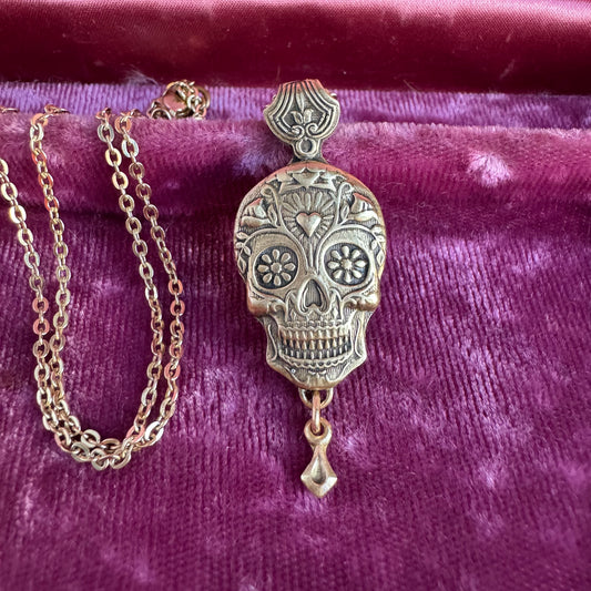 Sugar Skull artisan Day of the Dead artisan necklace in Nu Gold jewelers Brass