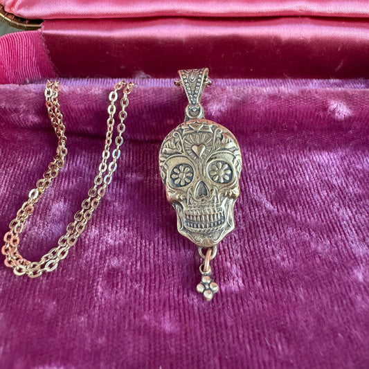 Sugar Skull artisan Day of the Dead artisan necklace in Nu Gold jewelers Brass