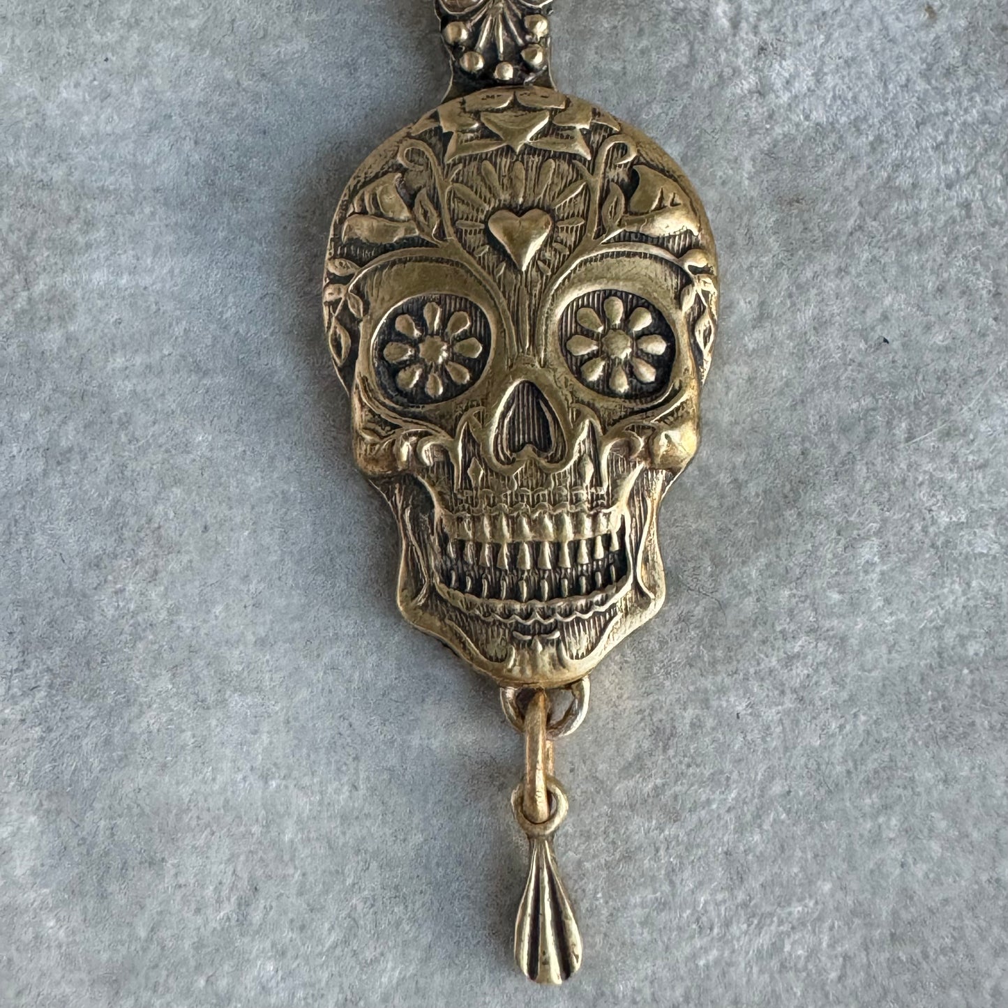 Sugar Skull artisan Day of the Dead artisan necklace in Nu Gold jewelers Brass