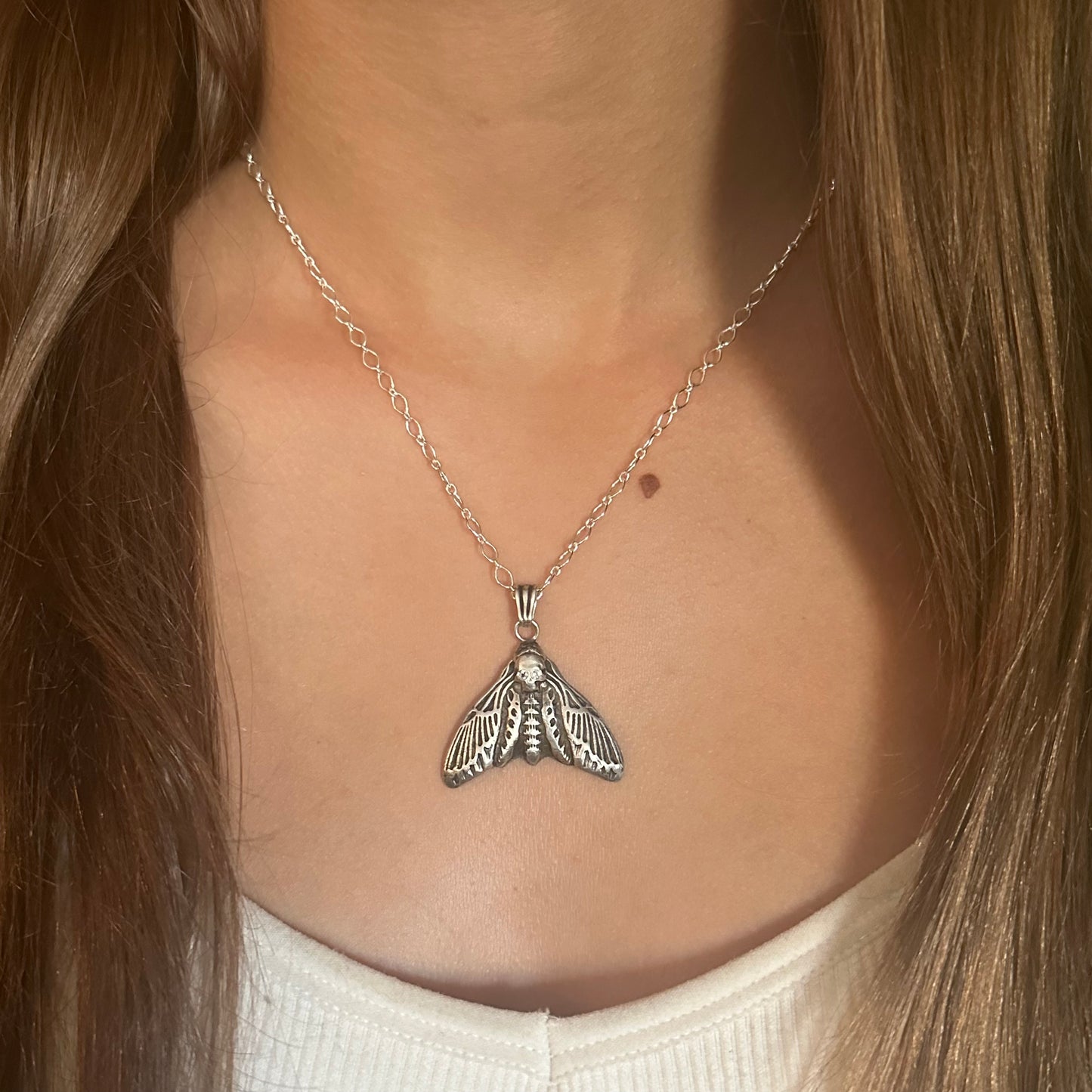 Artisan Moth necklace with white Sapphire in Sterling Silver