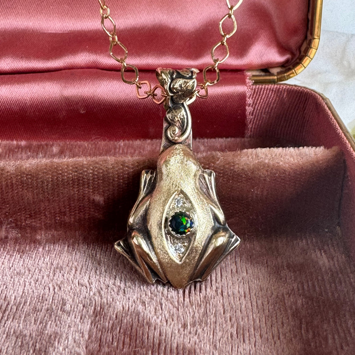Artisan Frog Black Kyocera Opal and Moissanite necklace in Brass