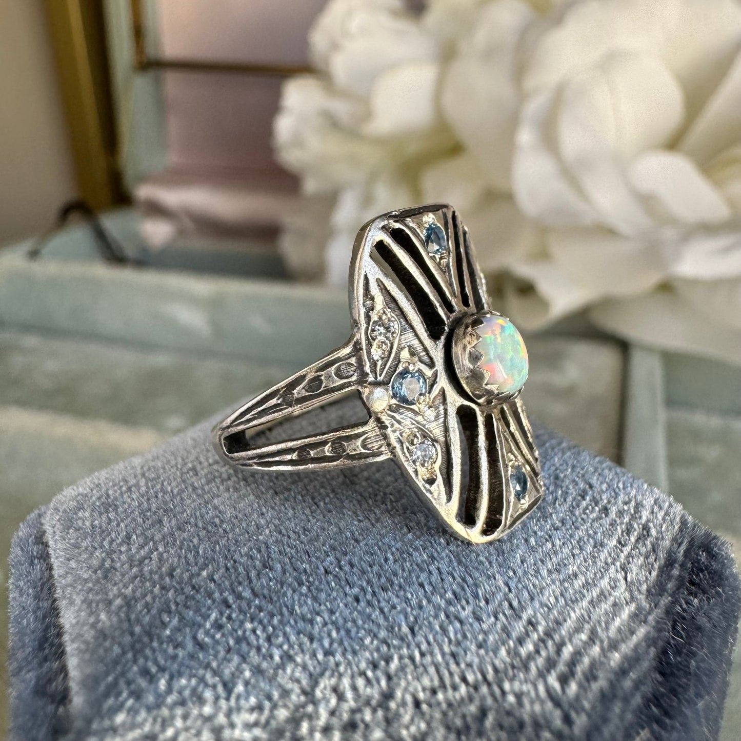 Art Deco Kyocera Opal, Blue Zircon, and White Sapphire artisan cigar band cocktail ring in Sterling Silver